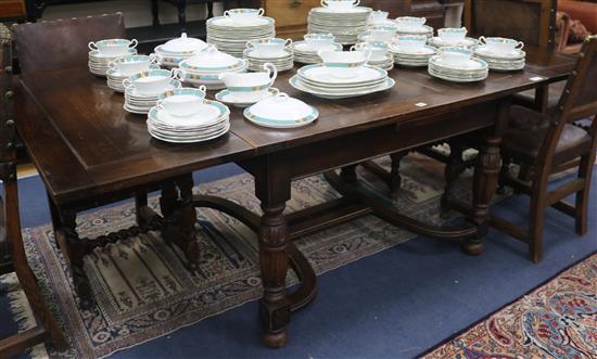 A 1920ss oak draw leaf dining table, W.216cm fully extended